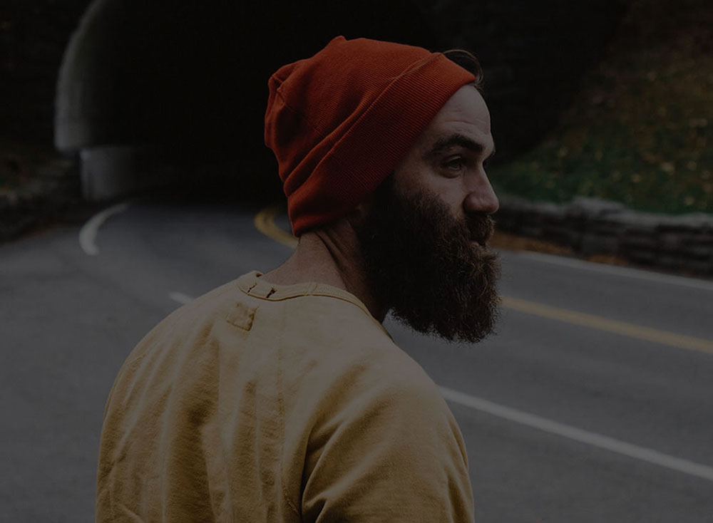 a man wearing a hat 